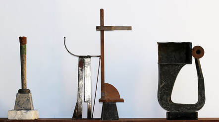 John Doyle | Three assemblages | timber, stone & metal